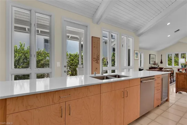 a kitchen with sink and window