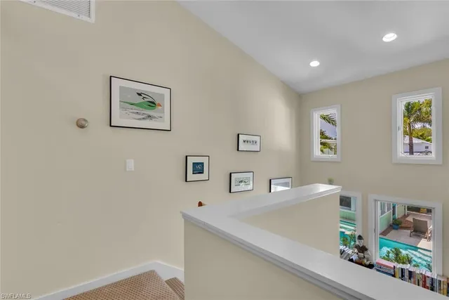 a view of a hallway with workspace