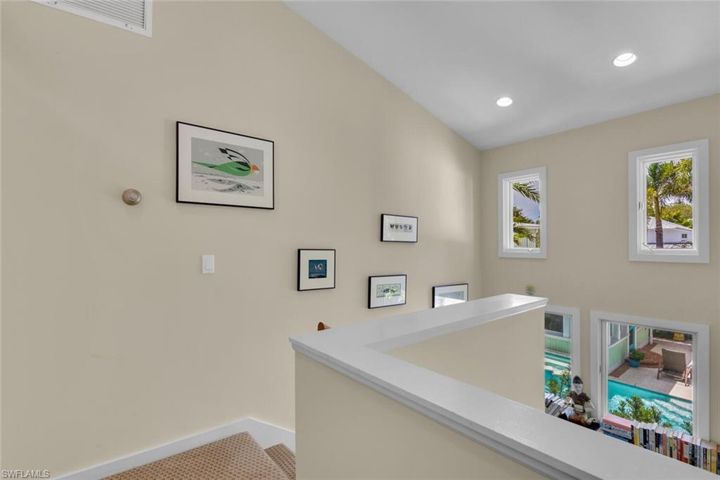 223 11th Avenue South Naples, FL 34102 - Photo 26 of 42 a view of a hallway with workspace