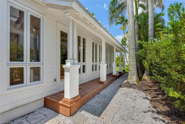 a front view of a house with a porch