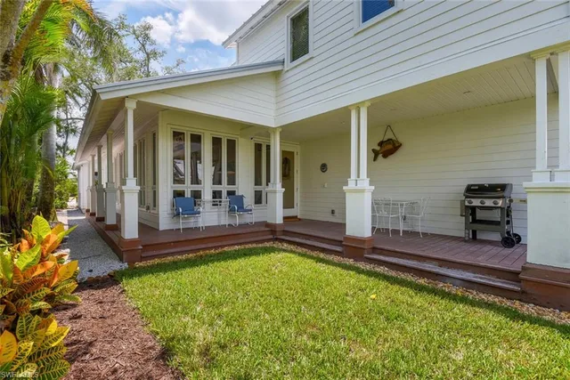 a view of a backyard with a backyard and porch