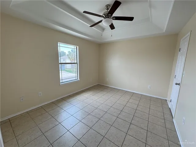 a view of an empty room and window
