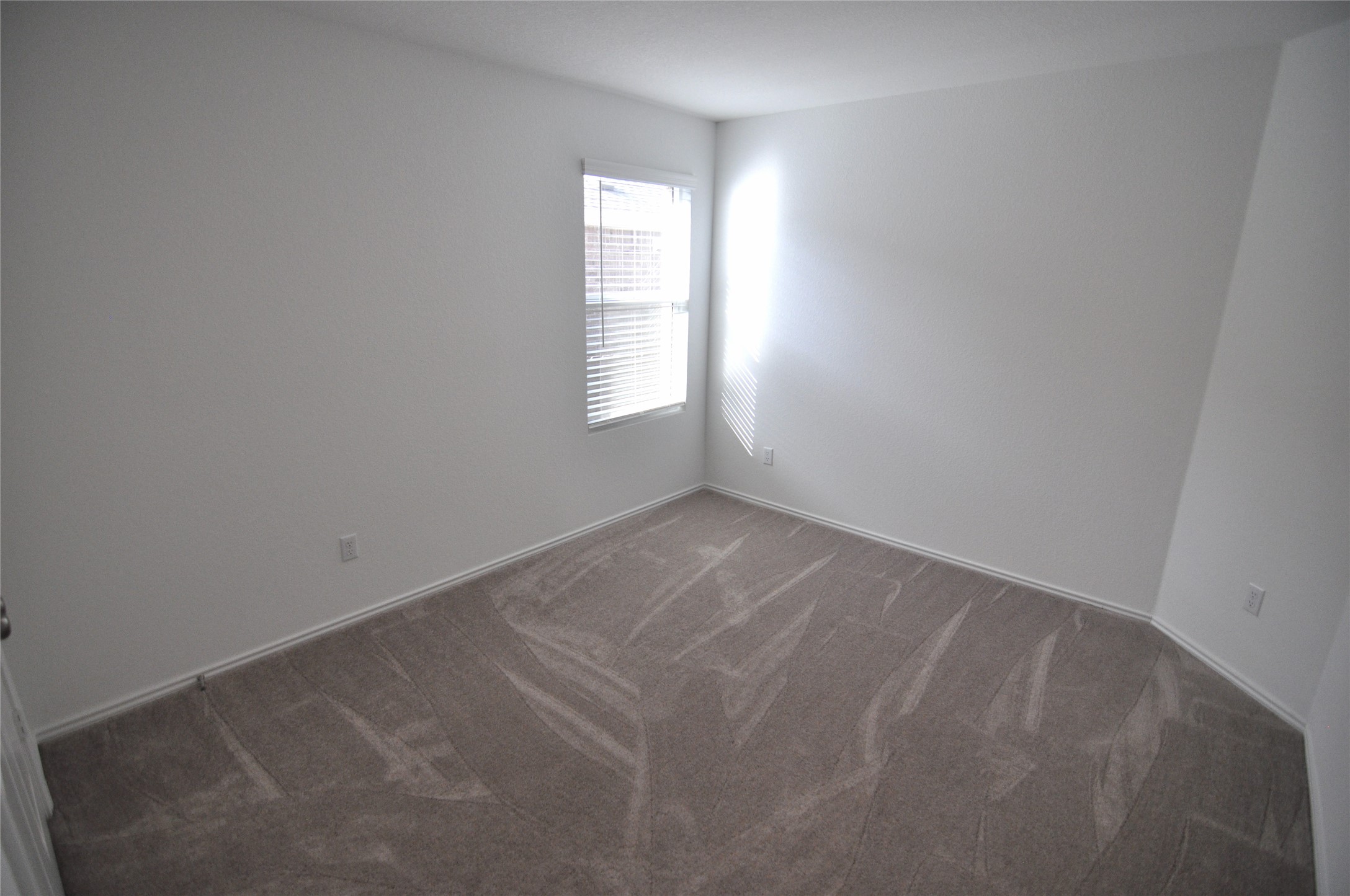 1537 Chapel Ranch Road Georgetown, TX 78628 - Photo 11 of 25 Spare room with dark colored carpet and baseboards