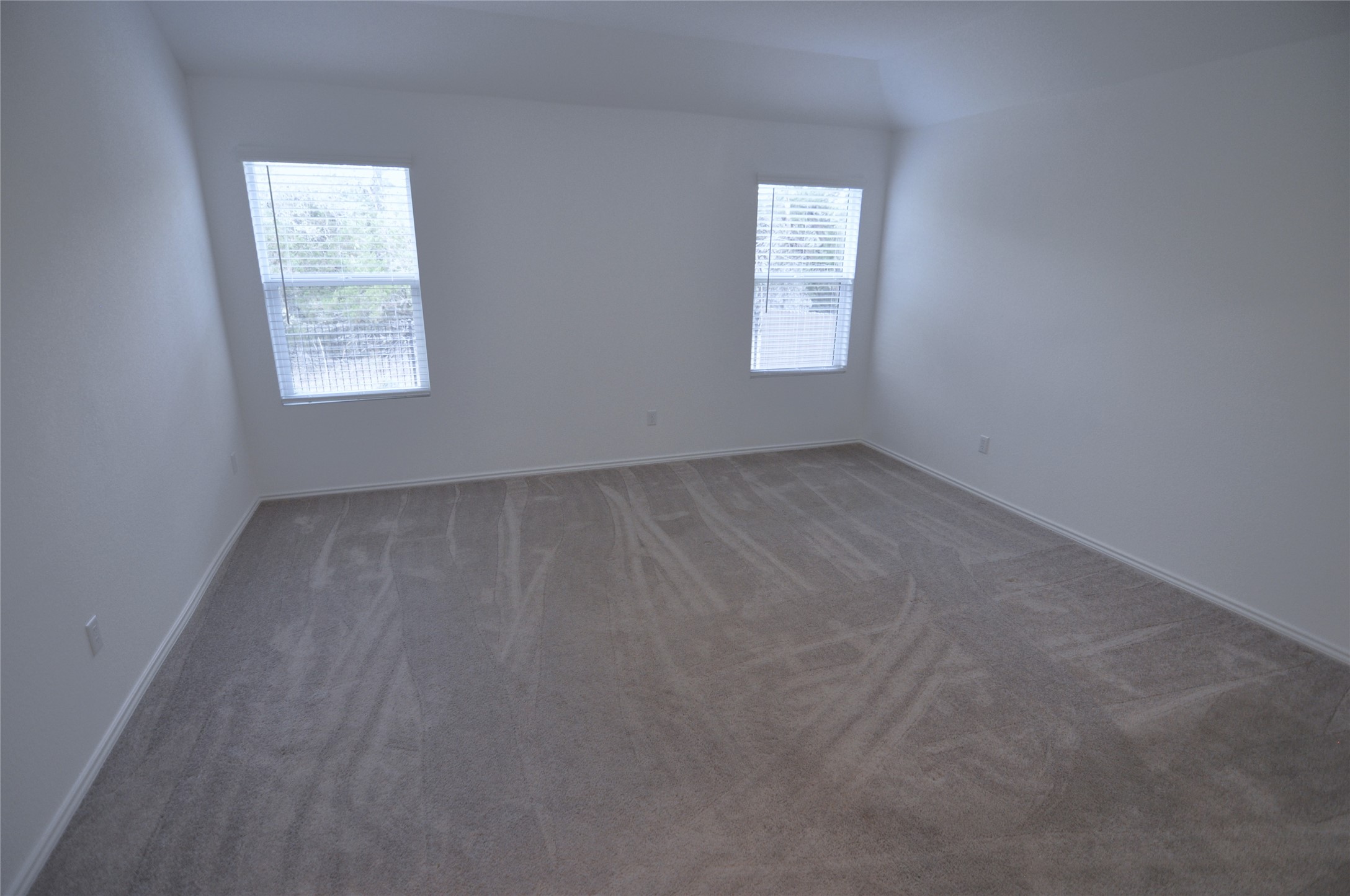1537 Chapel Ranch Road Georgetown, TX 78628 - Photo 16 of 25 Unfurnished room with dark colored carpet and baseboards