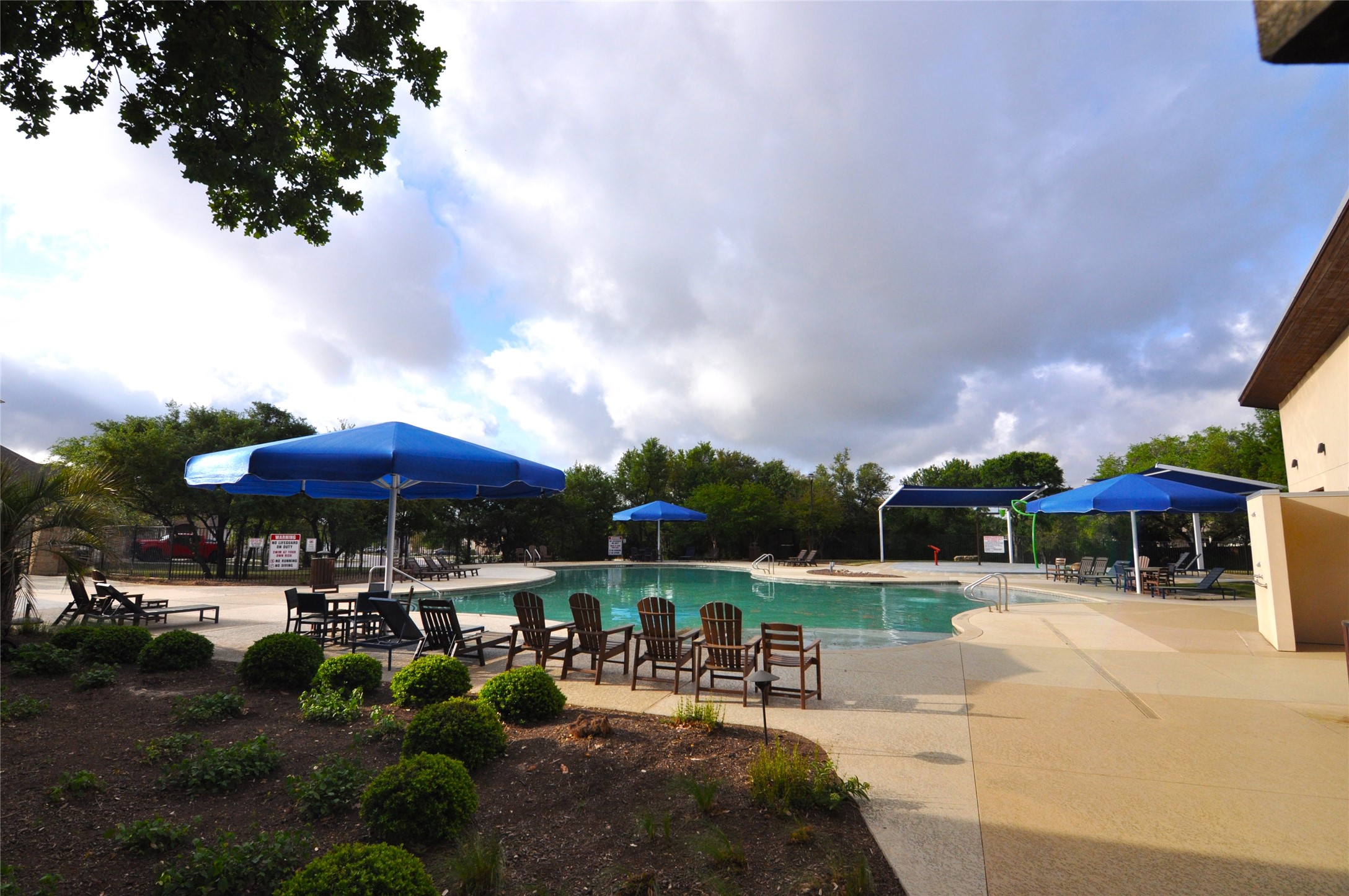 1537 Chapel Ranch Road Georgetown, TX 78628 - Photo 20 of 25 Community pool with a patio