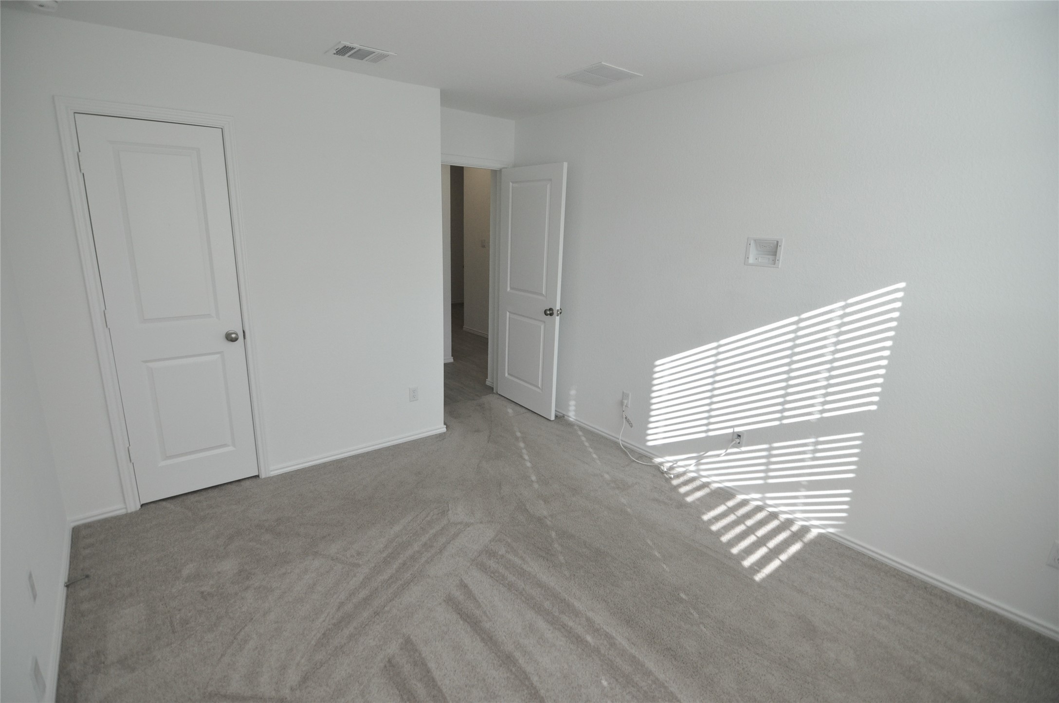 1537 Chapel Ranch Road Georgetown, TX 78628 - Photo 9 of 25 Unfurnished bedroom featuring carpet floors and baseboards