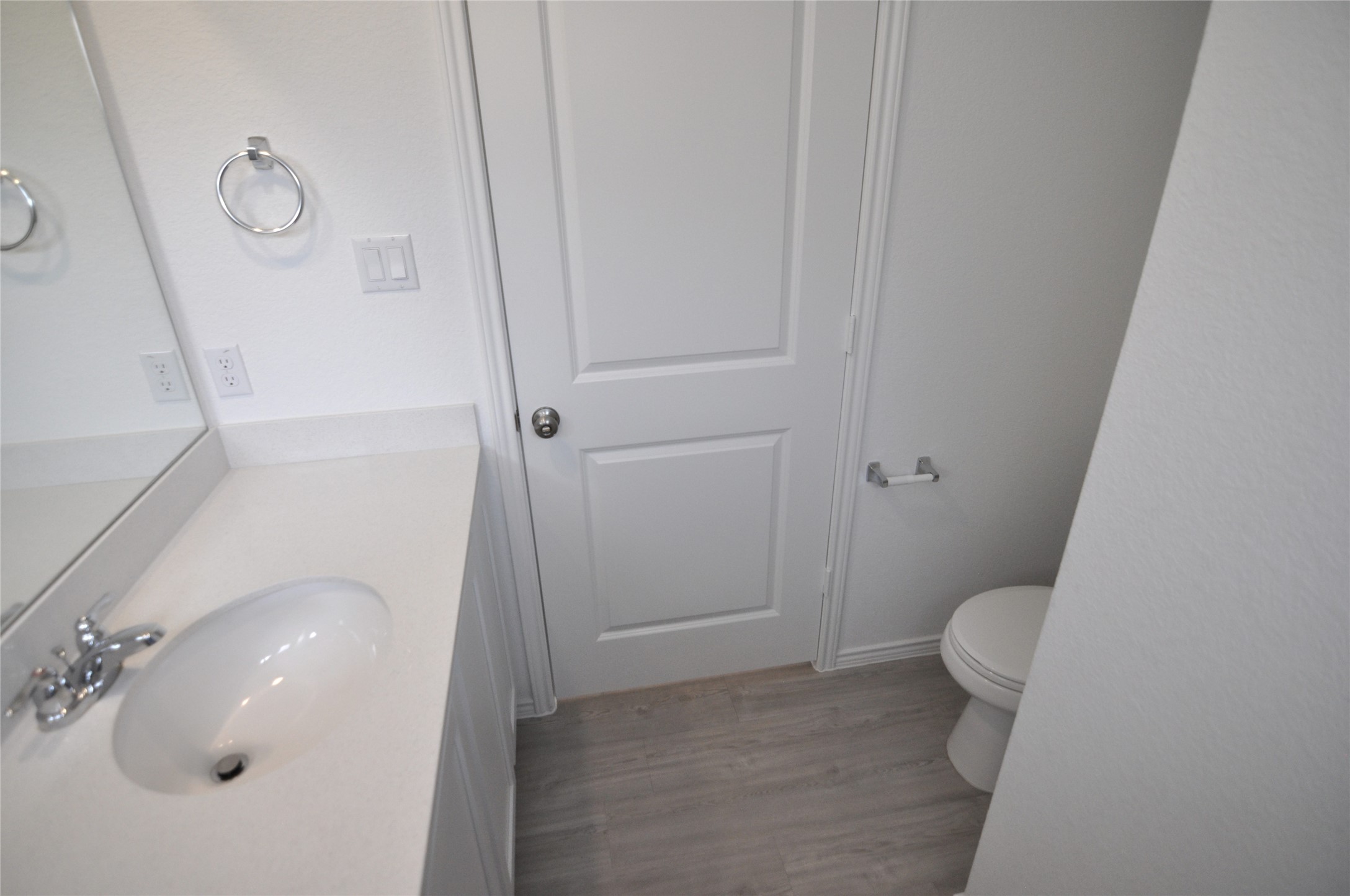 1537 Chapel Ranch Road Georgetown, TX 78628 - Photo 10 of 25 Bathroom featuring vanity and light wood-style flooring