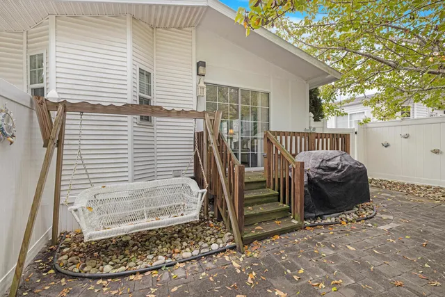 a view of a porch with a bench
