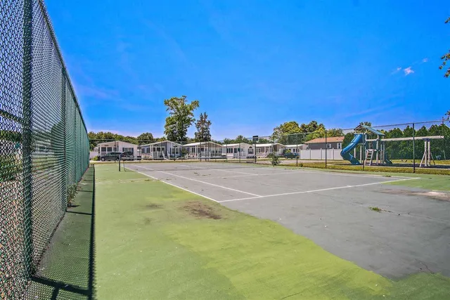 a view of a park with swings