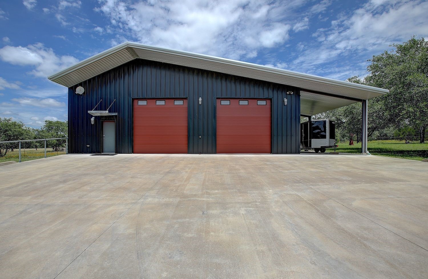 1928 Koether Road Carmine, TX 78932 - Photo 40 of 49 Mancave facade with 50' x 50' dimensions, insulated, HVAC/WIFI, complete with carport area