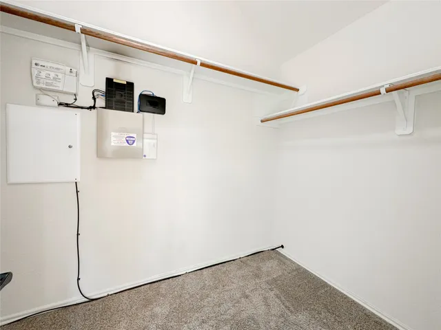a bathroom with a shower and a bath tub