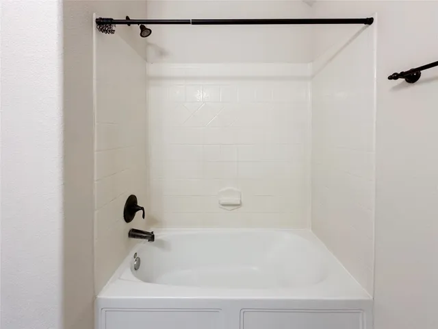 a view of swimming pool with a yard