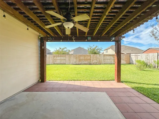 a view of a backyard with green space