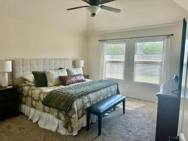 a kitchen with a stove and a microwave