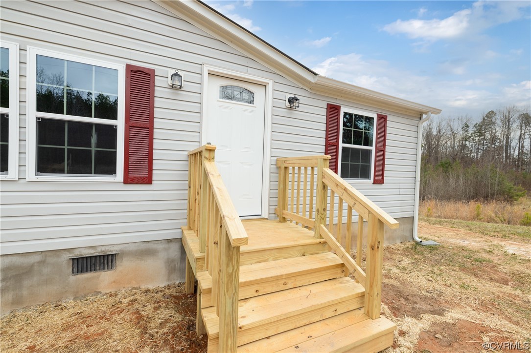 698 Burkeville Road Victoria, VA 23974 - Photo 3 of 24 a view of stairs with wooden floor and fence