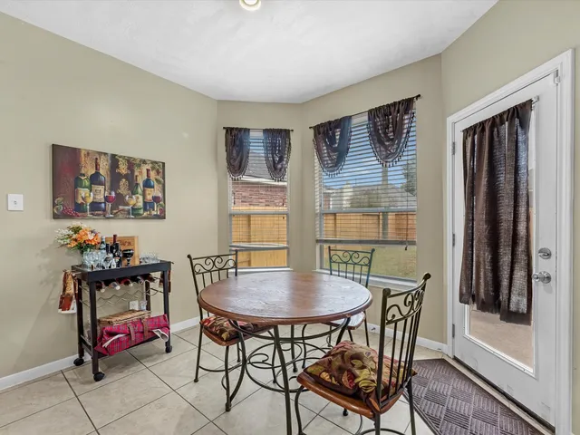a view of a livingroom with furniture and window