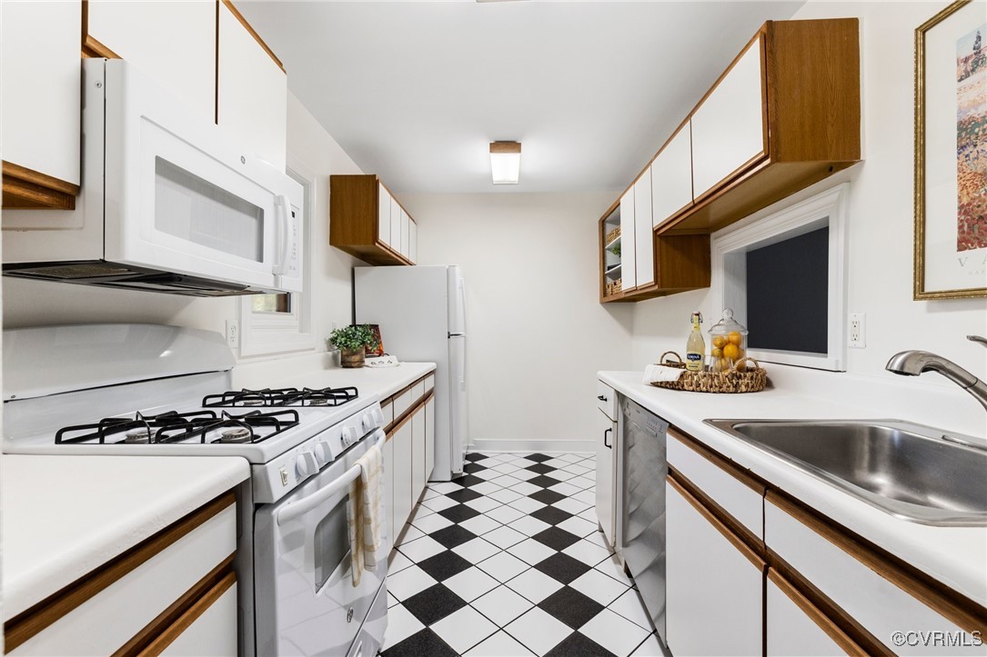 11719 South Briar Patch Drive Midlothian, VA 23113 - Photo 4 of 21 a kitchen with stainless steel appliances a sink stove and microwave
