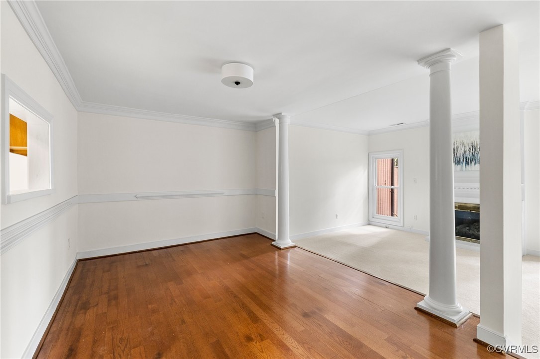 11719 South Briar Patch Drive Midlothian, VA 23113 - Photo 8 of 21 an empty room with wooden floor and windows