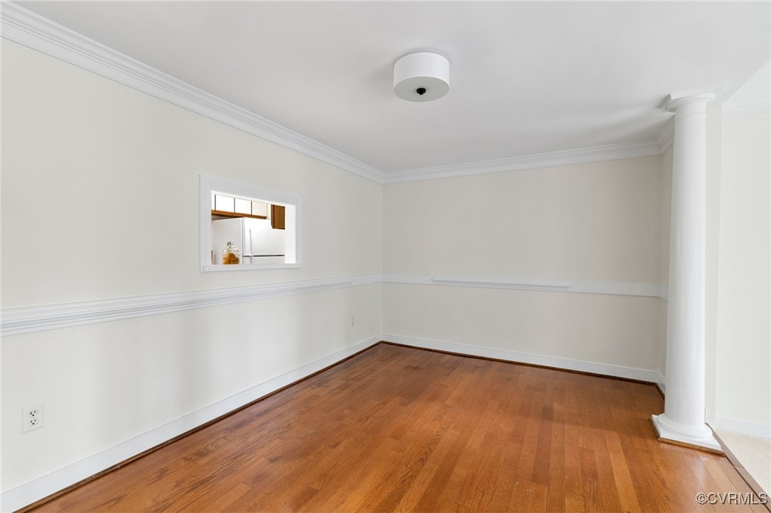 11719 South Briar Patch Drive Midlothian, VA 23113 - Photo 10 of 21 a view of a room that has wooden floor and white walls