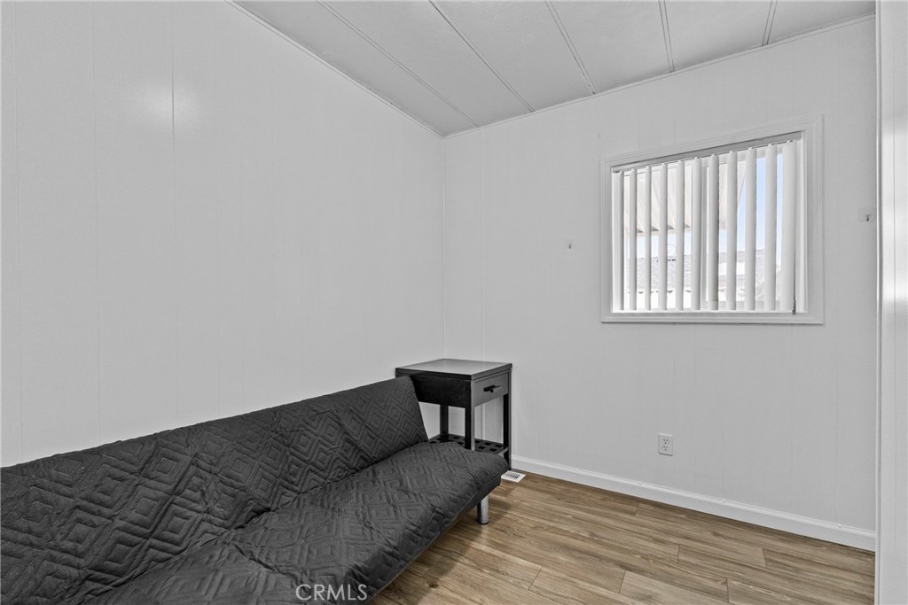 4000 Pierce Street, Unit 132 Riverside, CA 92505 - Photo 22 of 43 a living room with furniture and a window