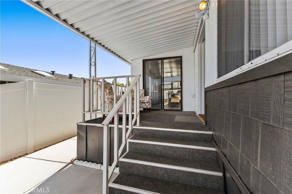 4000 Pierce Street, Unit 132 Riverside, CA 92505 - Photo 5 of 43 a view of entryway with wooden floor and stairs