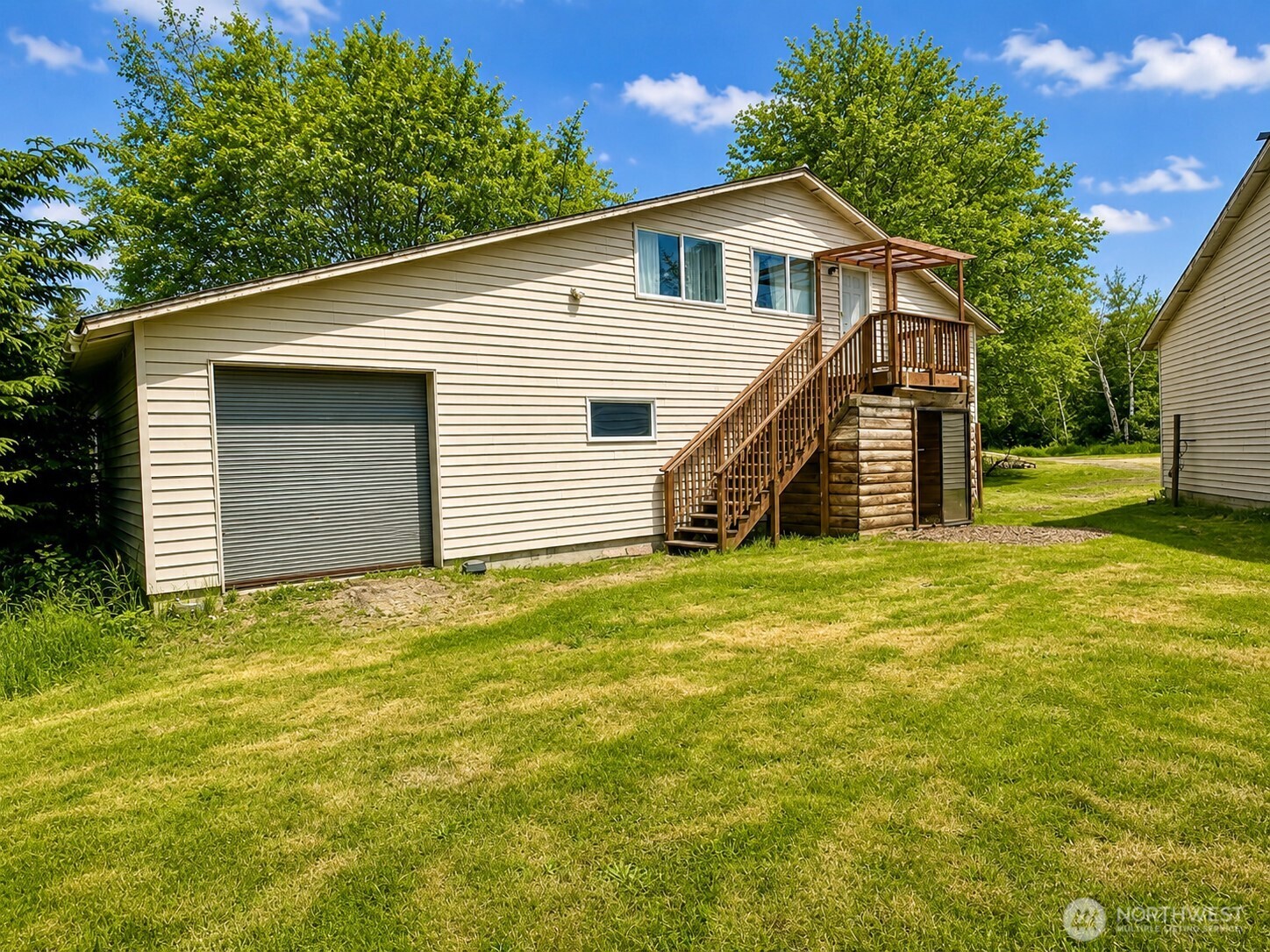 2154 Cranberry Road Grayland, WA 98547 - Photo 24 of 38 a view of a house with a backyard