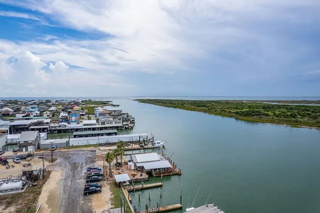 a bedroom with bed and a window