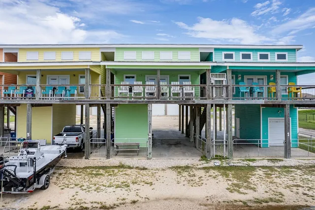 a view of a chairs and table in a patio