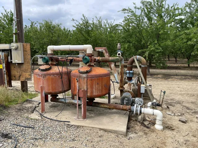 a view of a backyard with sitting area
