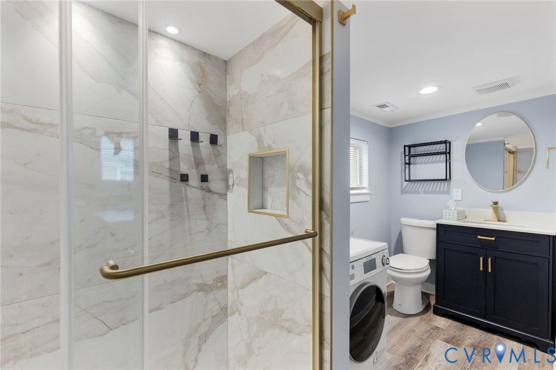 3061 Decatur Street Richmond, VA 23224 - Photo 17 of 23 Bathroom featuring vanity, washer / clothes dryer,