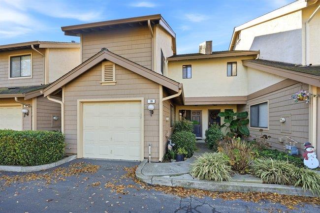 8550 Wren Avenue, Unit 3B Gilroy, CA 95020 - Photo 1 of 27 a view of a white house next to a yard