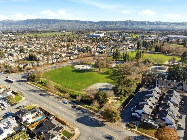 8550 Wren Avenue, Unit 3B Gilroy, CA 95020 - Photo 22 of 27 an aerial view of residential houses with outdoor space