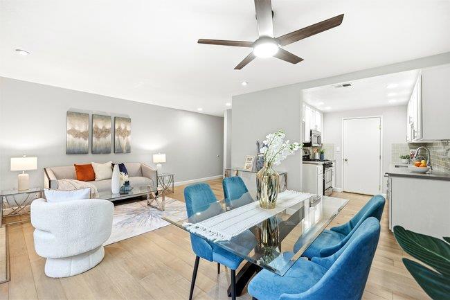8550 Wren Avenue, Unit 3B Gilroy, CA 95020 - Photo 3 of 27 a view of a dining room with furniture