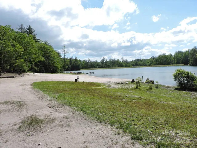a view of a lake with a big yard