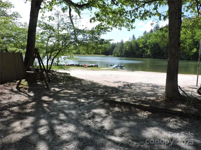 a view of a house with backyard porch and sitting area