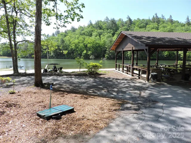 a view of swimming pool with outdoor seating