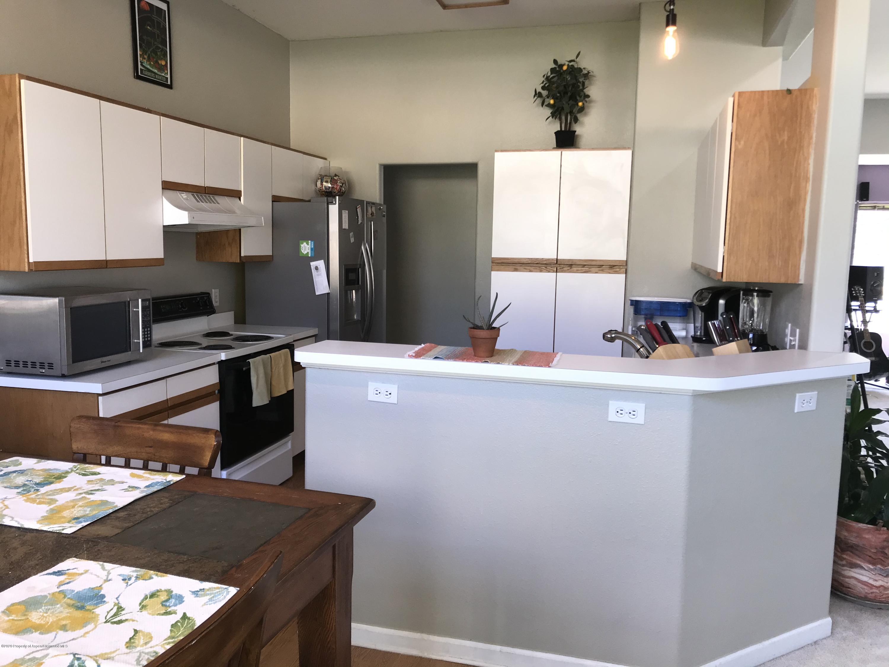 16 Limberpine Circle Parachute, CO 81635 - Photo 3 of 22 a room with table and chairs