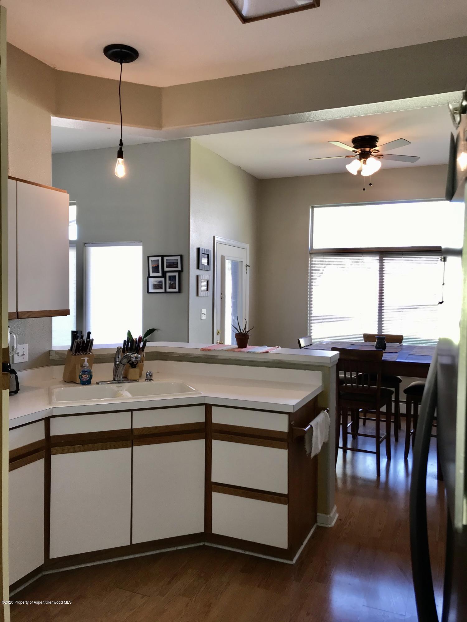 16 Limberpine Circle Parachute, CO 81635 - Photo 4 of 22 a bathroom with a sink and a large mirror