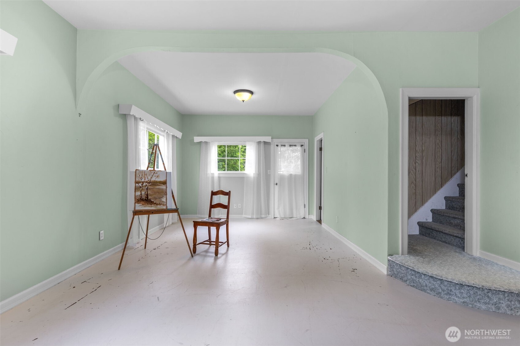 135 Walker Road Northwest Poulsbo, WA 98370 - Photo 7 of 24 a view of a livingroom with furniture and windows