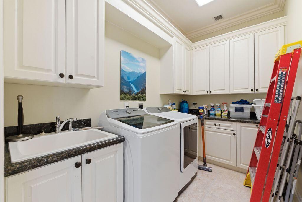 2221 Northeast 48th Court Lighthouse Point, FL 33064 - Photo 28 of 81 Laundry
