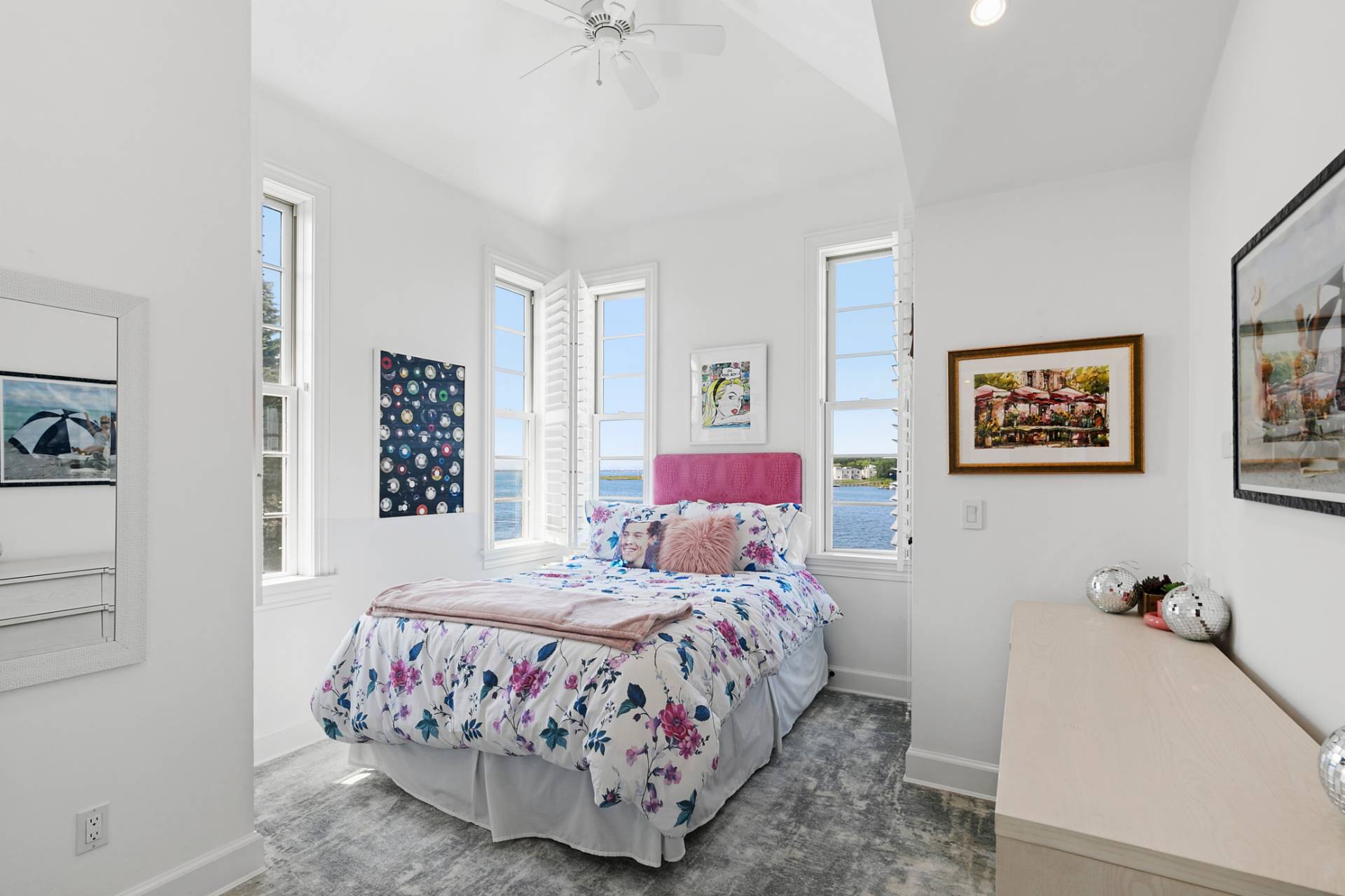 69 Shore Road Westhampton, NY 11977 - Photo 18 of 34 a bedroom with a bed and a table