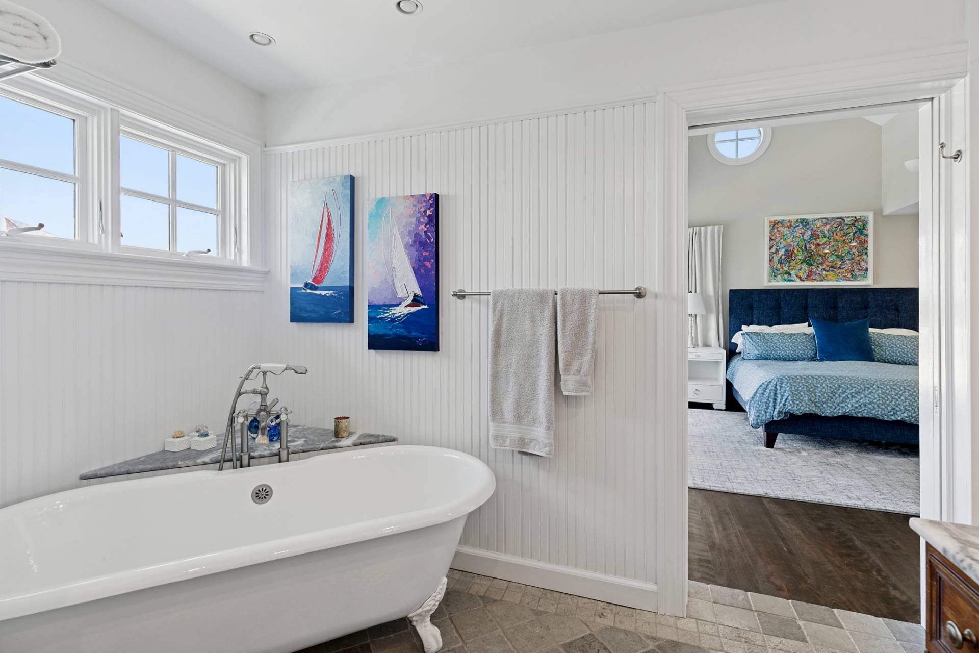 69 Shore Road Westhampton, NY 11977 - Photo 24 of 34 a bathroom with a sink and a bathtub