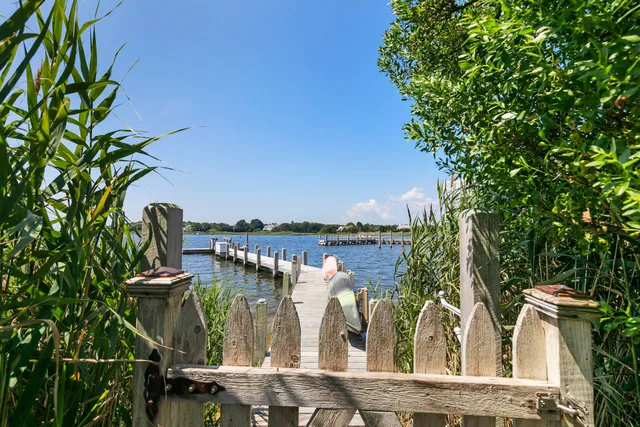 a view of a lake with sitting area