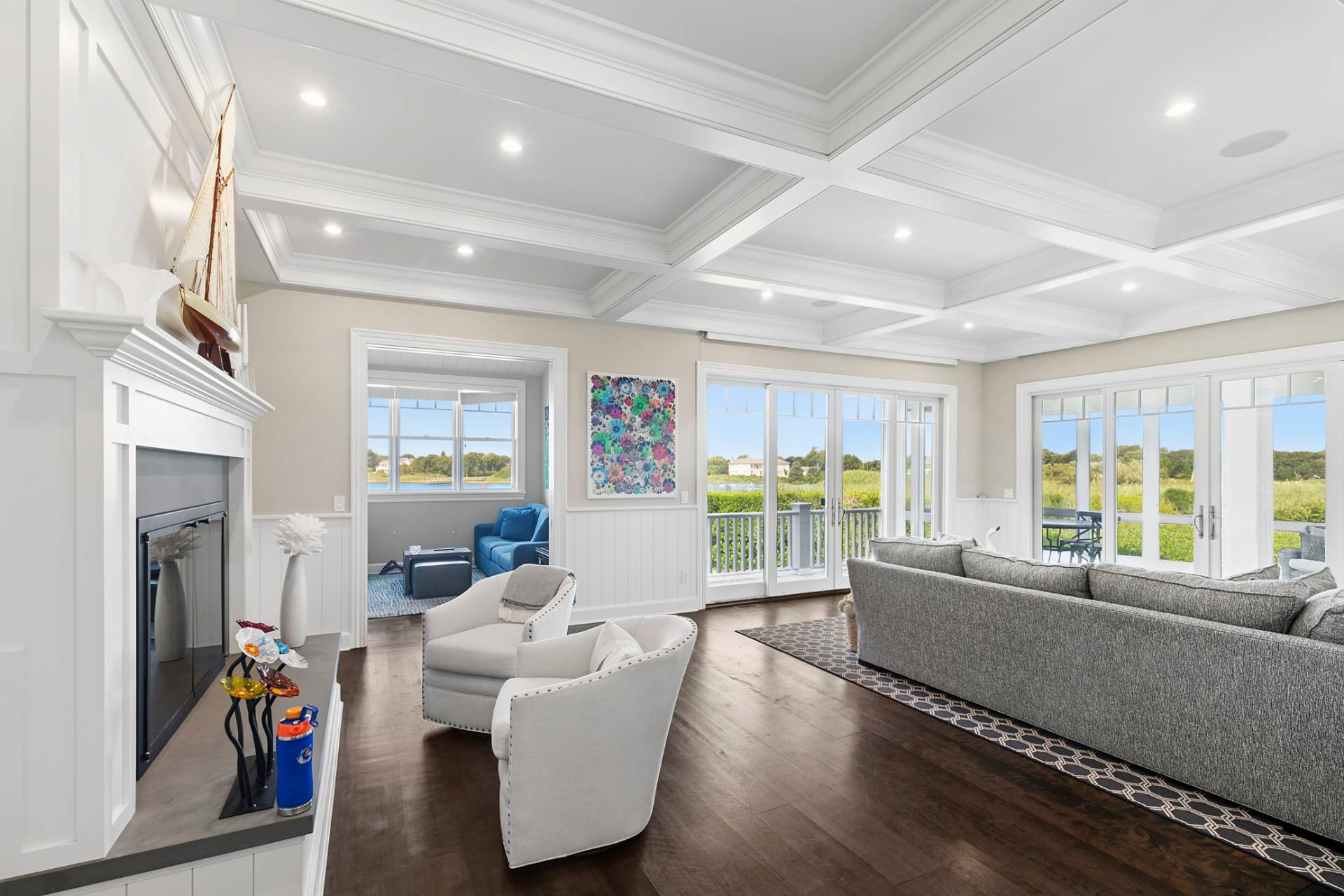 69 Shore Road Westhampton, NY 11977 - Photo 5 of 34 a living room with furniture and a large window