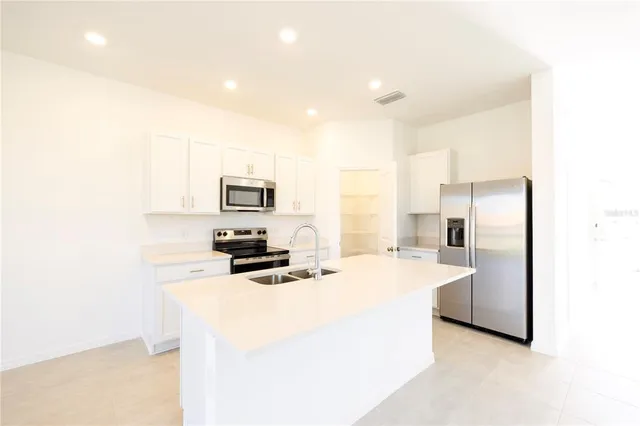 a bathroom with a toilet and a bathtub