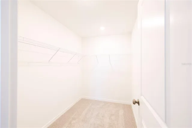 an aerial view of house with a yard