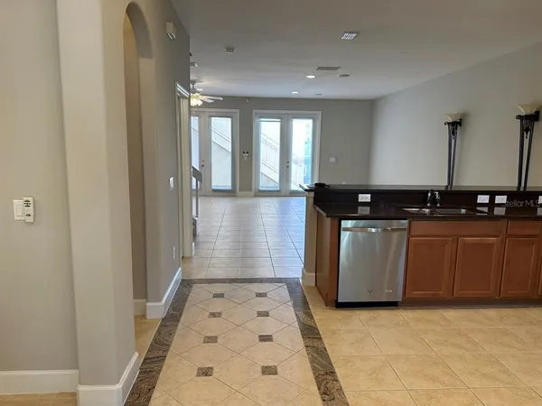 a view of a kitchen with a sink