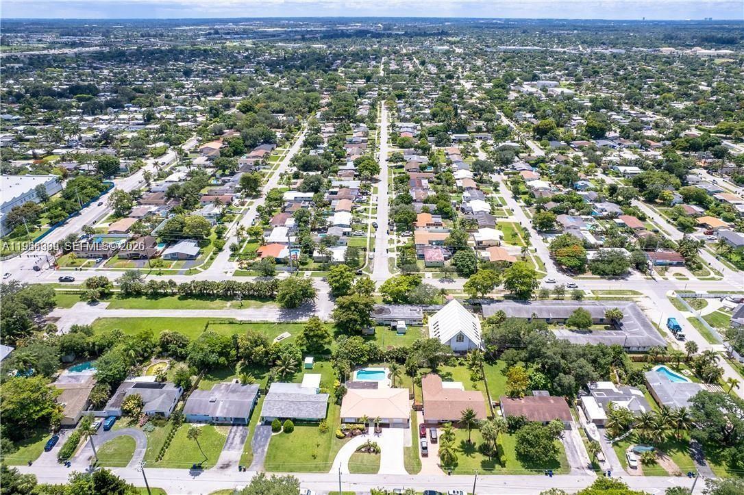 2271 Southwest 30th Terrace Fort Lauderdale, FL 33312 - Photo 36 of 40 an aerial view of residential houses with outdoor space and trees