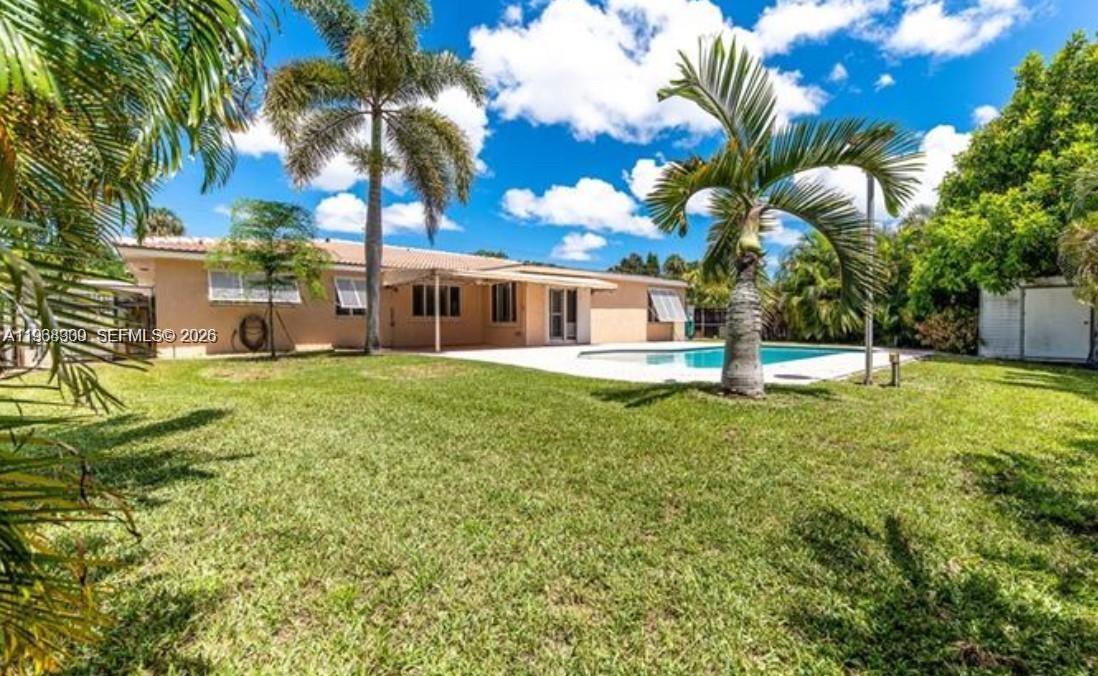 2271 Southwest 30th Terrace Fort Lauderdale, FL 33312 - Photo 40 of 40 a view of a house with a yard