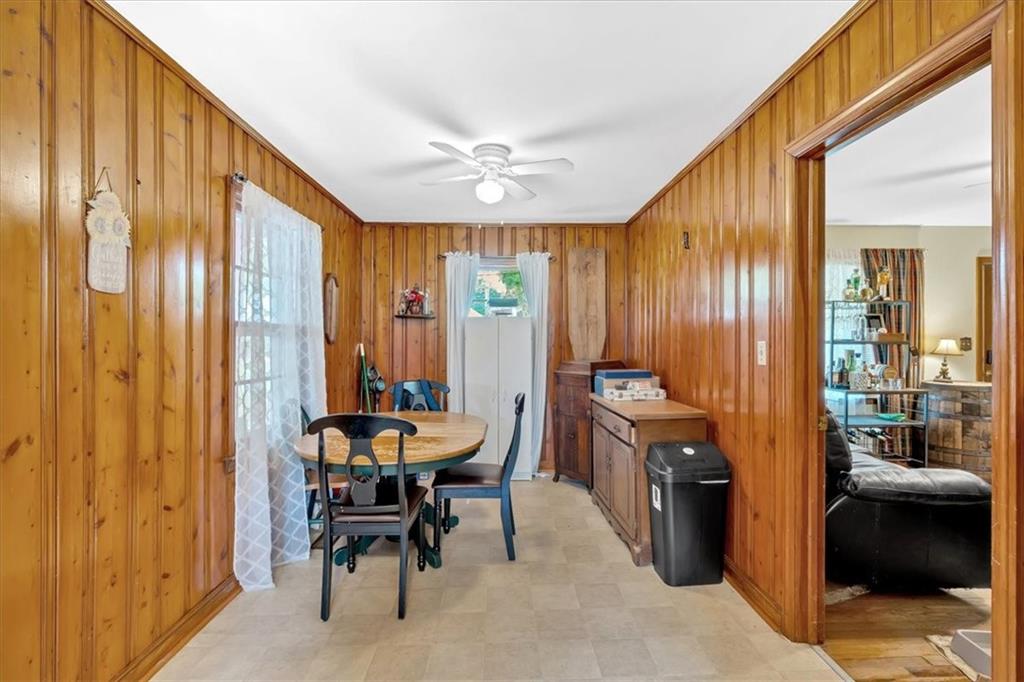 7783 Cantrell Road Douglasville, GA 30135 - Photo 15 of 38 a view of a a dining room with furniture window and outside view